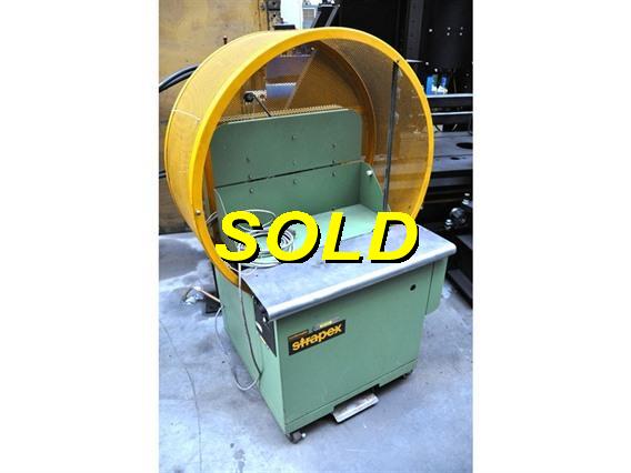 Strapex string tying machine