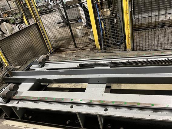 Fanuc Robot + 3 Breton machining centers 5 axes