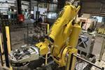 Fanuc Robot + 3 Breton machining centers 5 axes