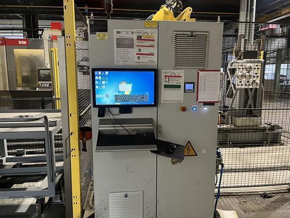 Fanuc Robot + 3 Breton machining centers 5 axes