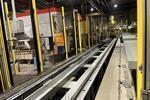 Fanuc Robot + 3 Breton machining centers 5 axes