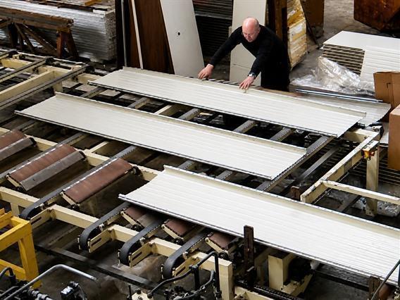 Jensen Sandwich panel line for sectional gates
