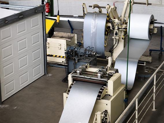Jensen Sandwich panel line for sectional gates