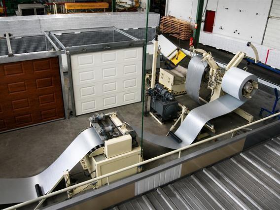 Jensen Sandwich panel line for sectional gates