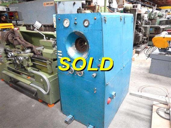 Tube reducing machine