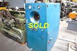 Tube reducing machine