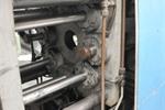 Tube reducing machine