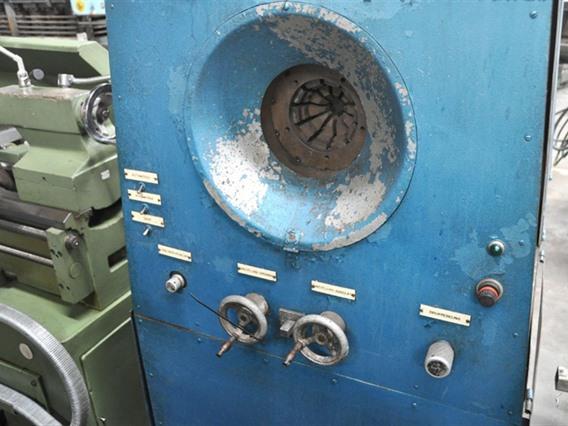 Tube reducing machine