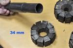 Tube reducing machine