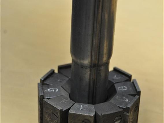 Tube reducing machine