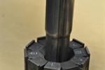 Tube reducing machine