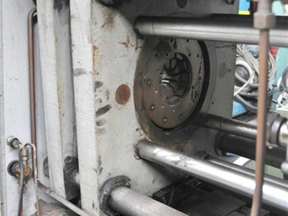 Tube reducing machine